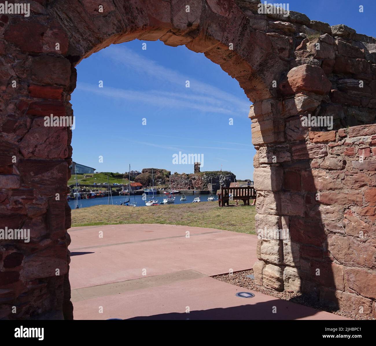 Dunbar Harbour viewed through entrance to Dunbar Battery Stock Photo