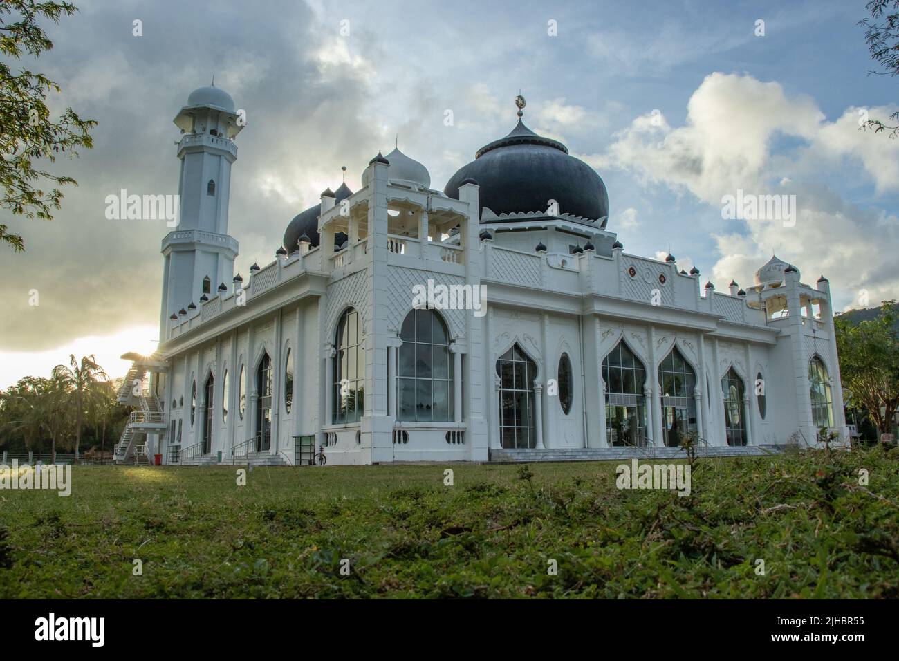Photo of the Rahmatullah Lampuuk Mosque, a mosque left by the Tsunami in Aceh, Indonesia. Stock Photo