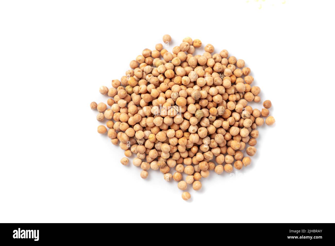heap of dried chickpea beans isolated on white background, close up