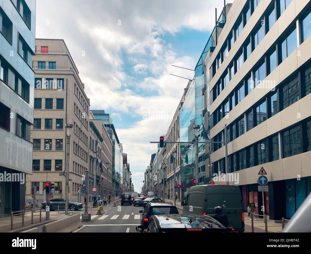 Few cars stopped at the Red traffic light in Brussels Stock Photo - Alamy