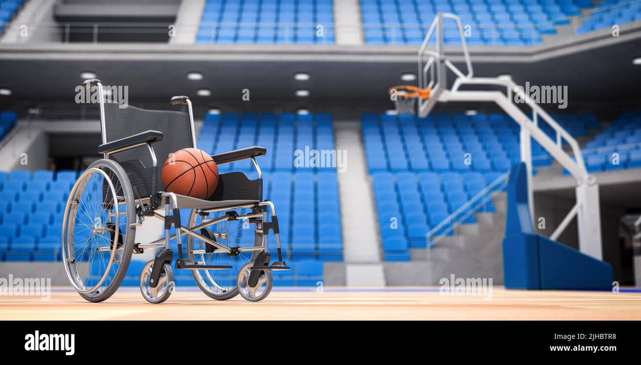 Wheel chaiir with basketball ball on empty basketball arena. Motivation ...
