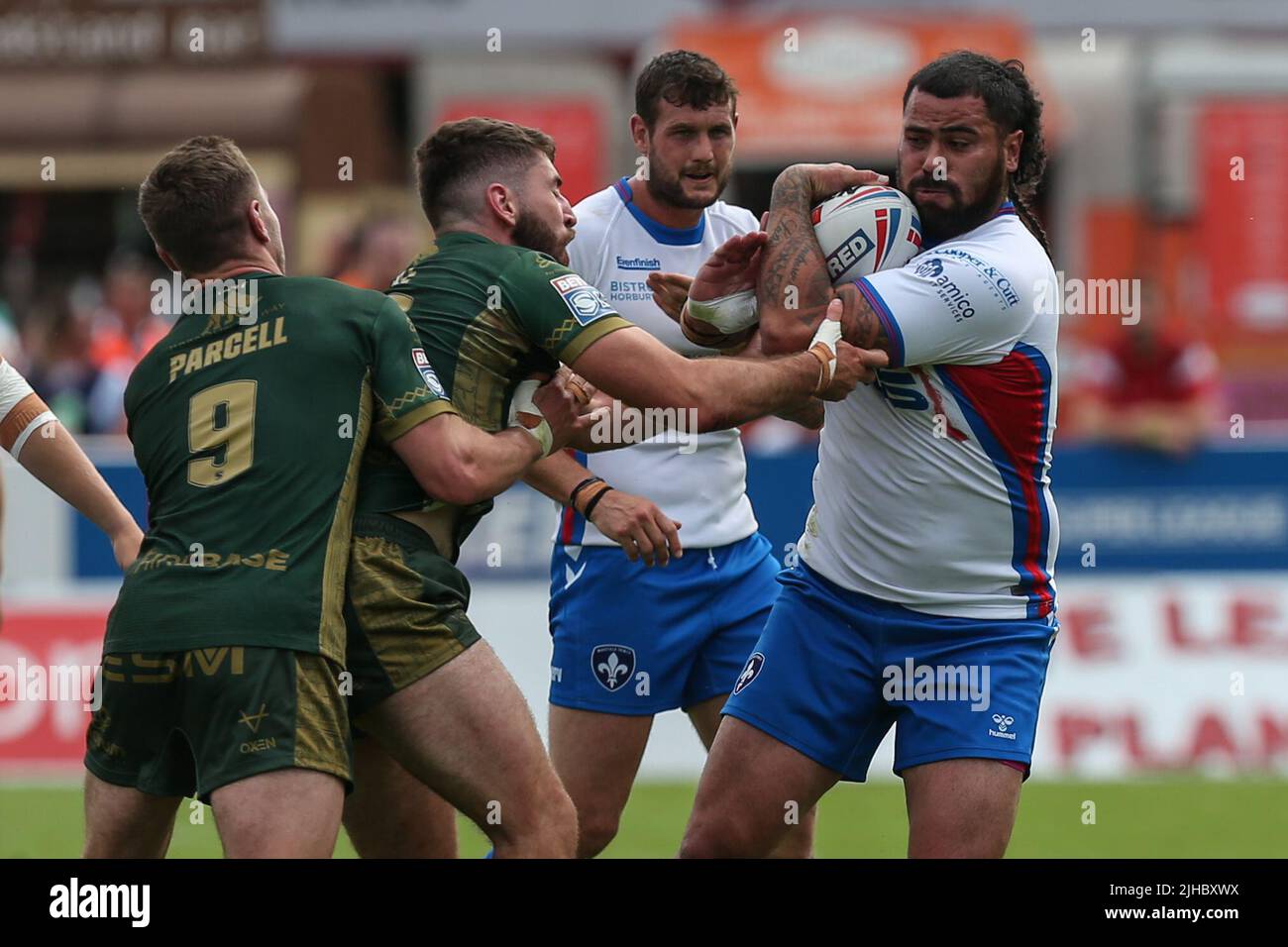 David Fifita #35 of Wakefield Trinity is tackled by Sam Royle #35 of Hull KR Stock Photo