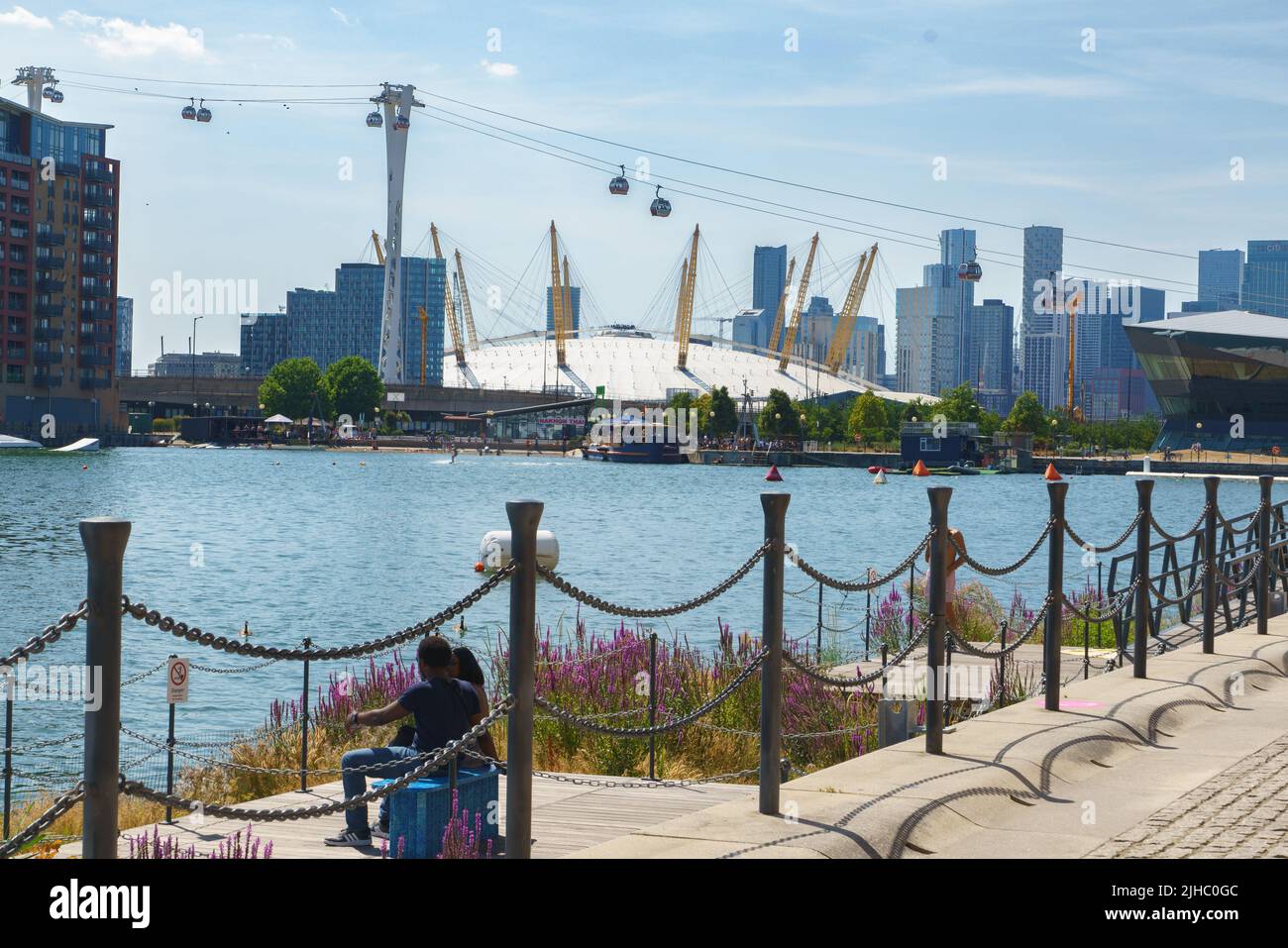 View of the Millennium Dome and the Emirates Cable Car, from the Royal Victoria Dock, London, UK Stock Photo