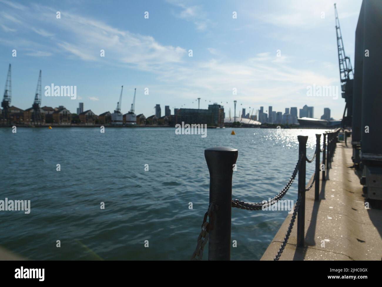 View over Royal Victoria Dock towards the Millennium Dome, London, UK Stock Photo