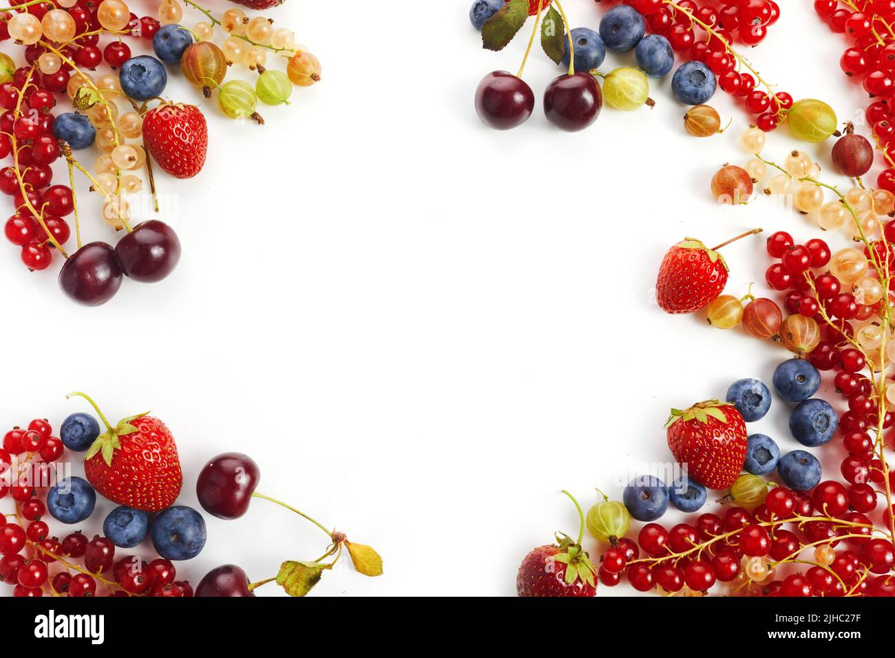 Various fresh summer berries frame on white background. Top view Stock Photo