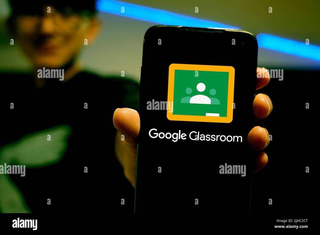 Google Classroom logo and digital learning interface on a tablet screen ...