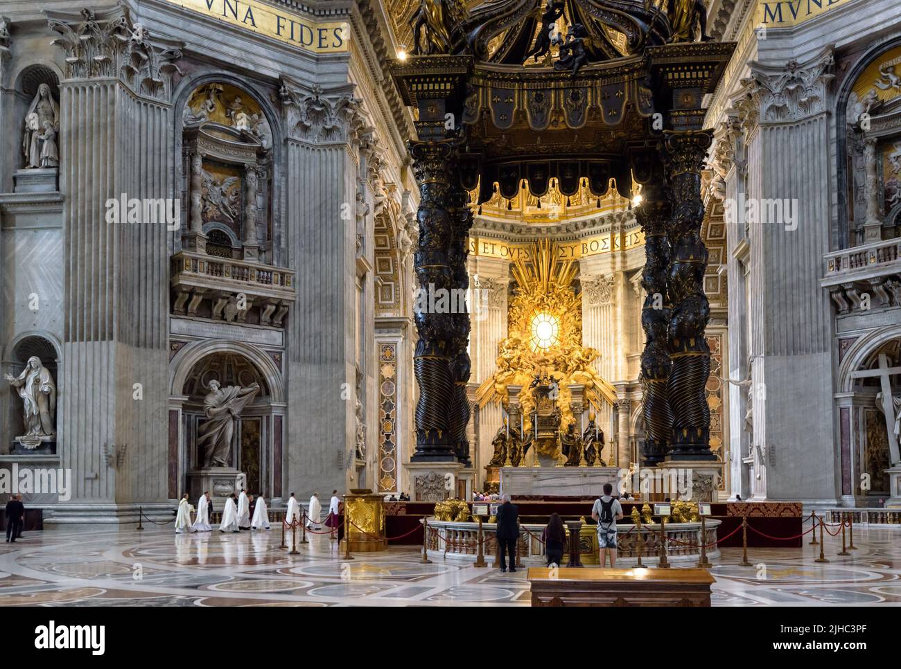 Rome - Jun 12, 2021: Inside St Peter Basilica, Rome, Italy. Ornate Saint Peters cathedral is top landmark of Rome and Vatican City. Luxury baldacchino Stock Photo