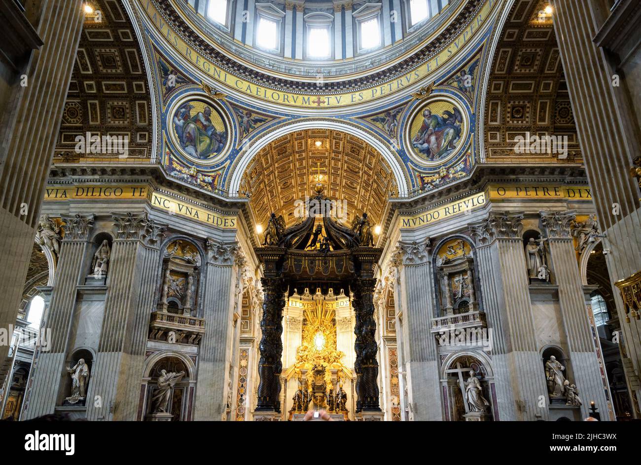 Rome - Jun 12, 2021: Inside St Peter Basilica, Rome, Italy. Saint Peters cathedral is top landmark of Rome and Vatican City. Ornate Baroque interior o Stock Photo