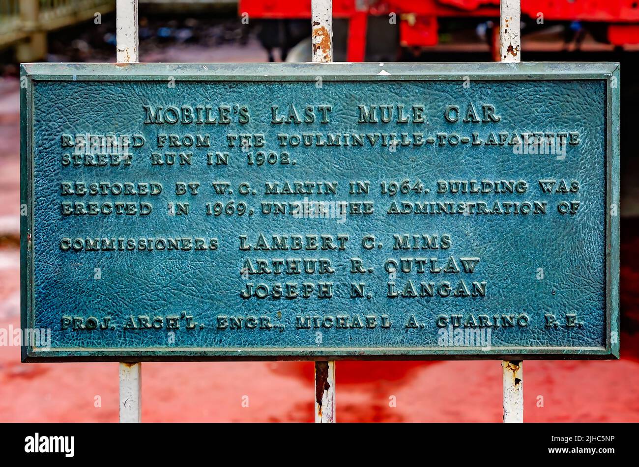 A historic plaque tells the story of Mobile’s last mule car, July 10, 2022, in Mobile, Alabama. Stock Photo