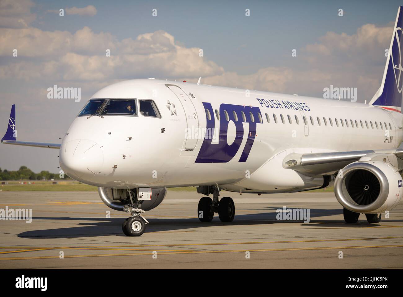 Otopeni, Romania - July 17, 2022: LOT Polish airline plane on the taxiway of the Henri Coanda Airport. Stock Photo