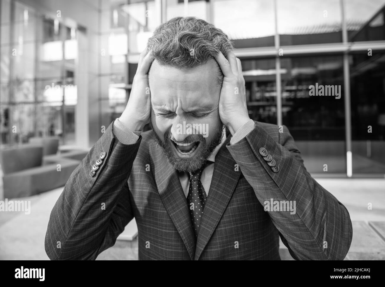 mature bearded boss portrait. frustrated businessman in formalwear. business failure Stock Photo