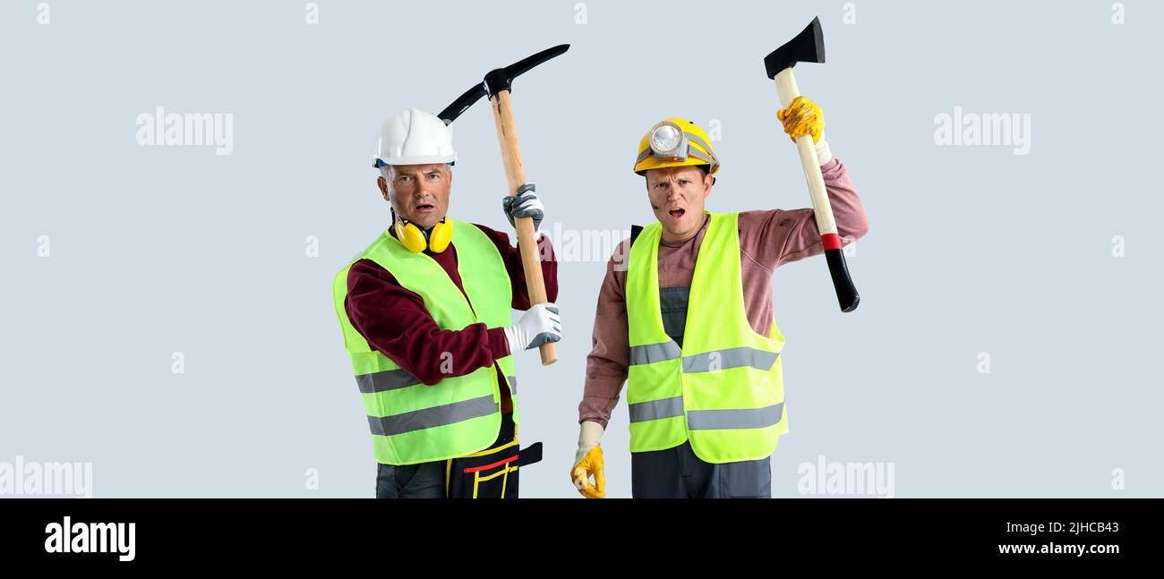 Protesting miner men on grey background Stock Photo