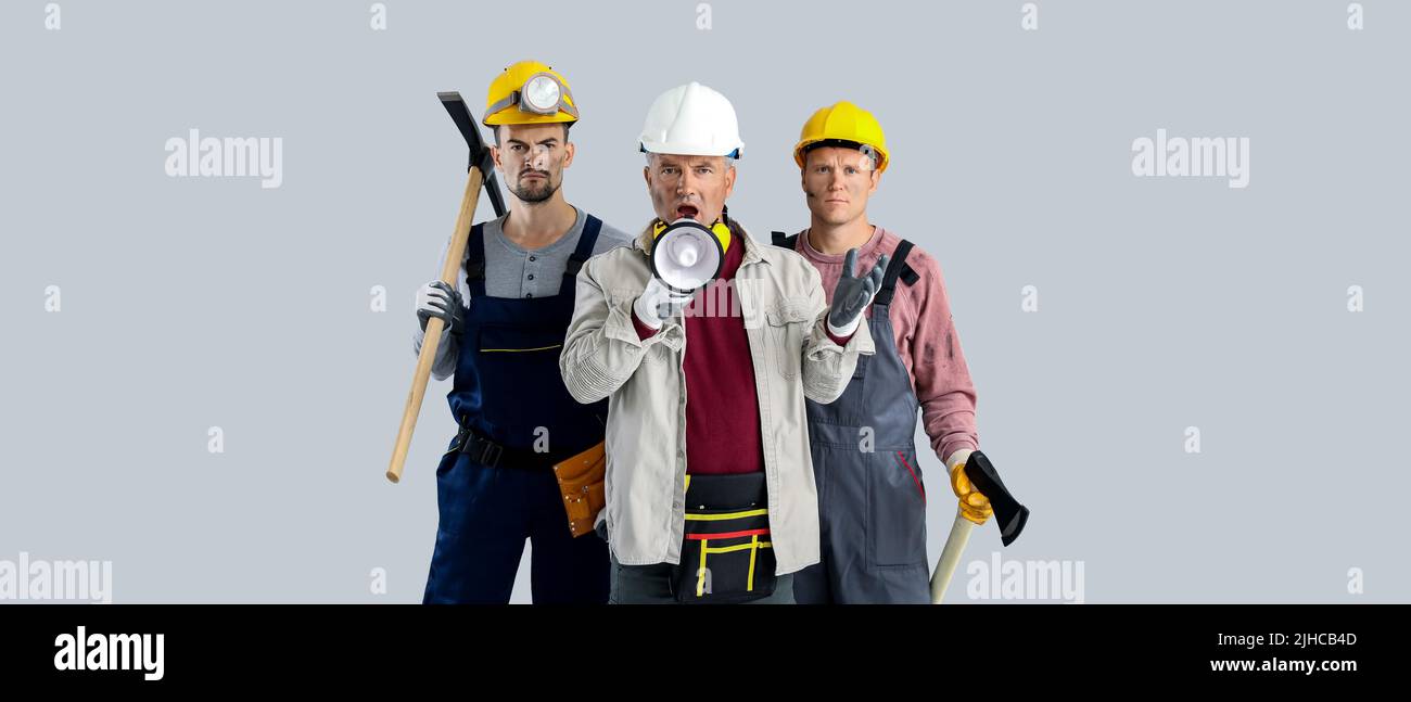 Protesting miner men on grey background Stock Photo