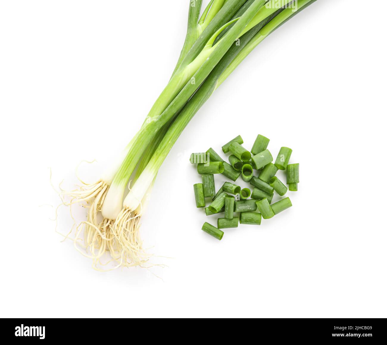 Fresh green onion on white background Stock Photo - Alamy