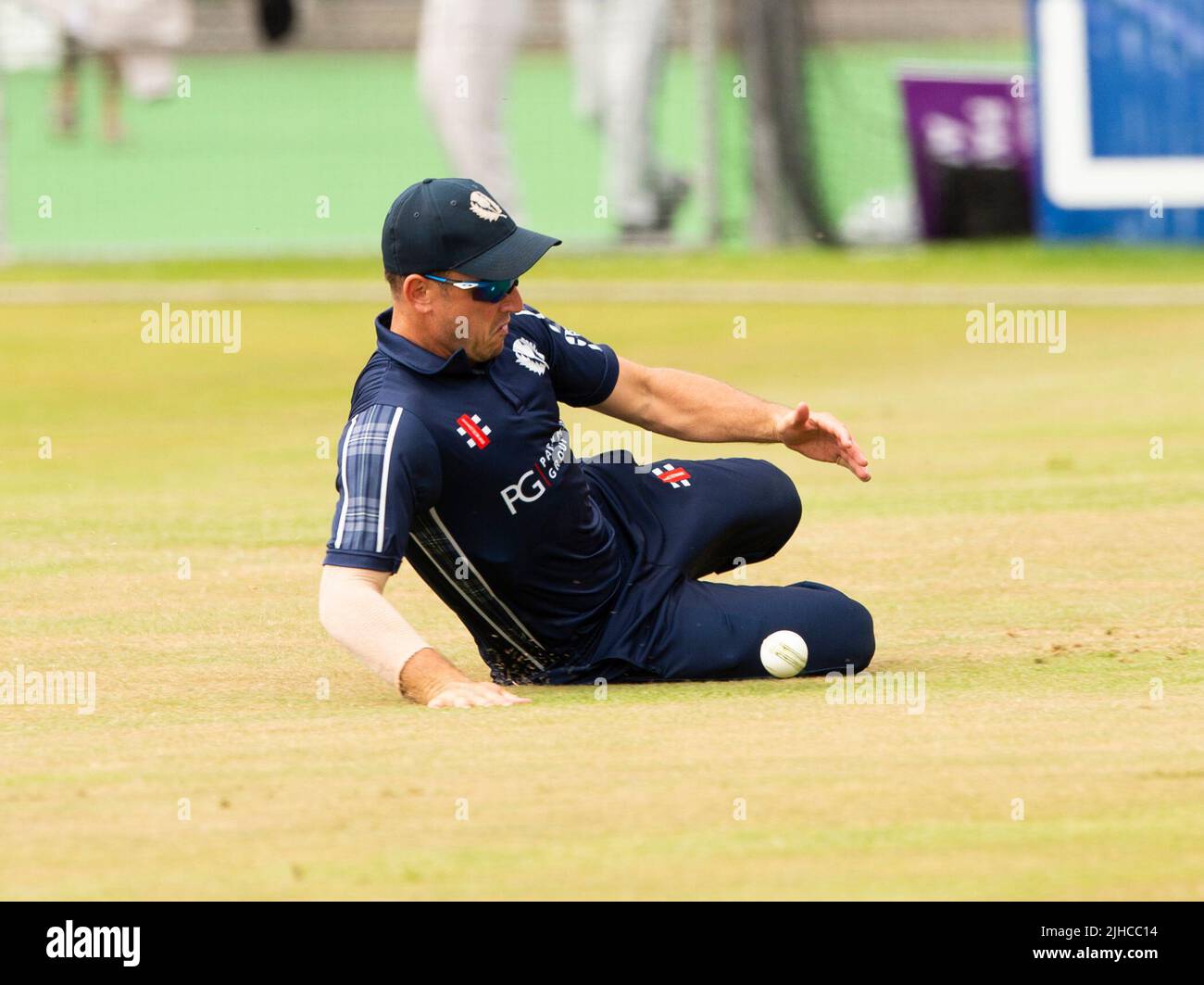 ICC Men's Cricket World Cup League 2 - Scotland v, Nepal. 17th July, 2022. Scotland take on Nepal for the second time in the ICC Div 2 Men's Cricket World Cup League 2 at Titwood, Glasgow. Pic shows: Great stop by Scotland's Chris Greaves. Credit: Ian Jacobs/Alamy Live News Stock Photo