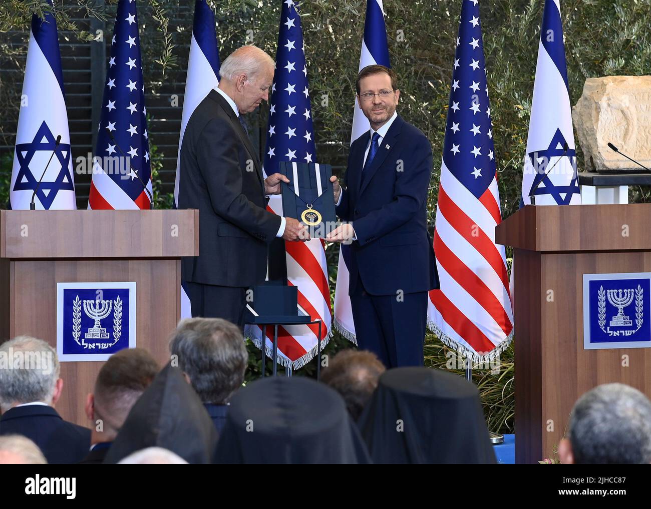 Jerusalem, Israel. 14 July, 2022. U.S President Joe Biden, receives the Israeli Presidential Medal of Honor from Israeli President Isaac Herzog, right, July 14, 2022 in Jerusalem, Israel. Stock Photo
