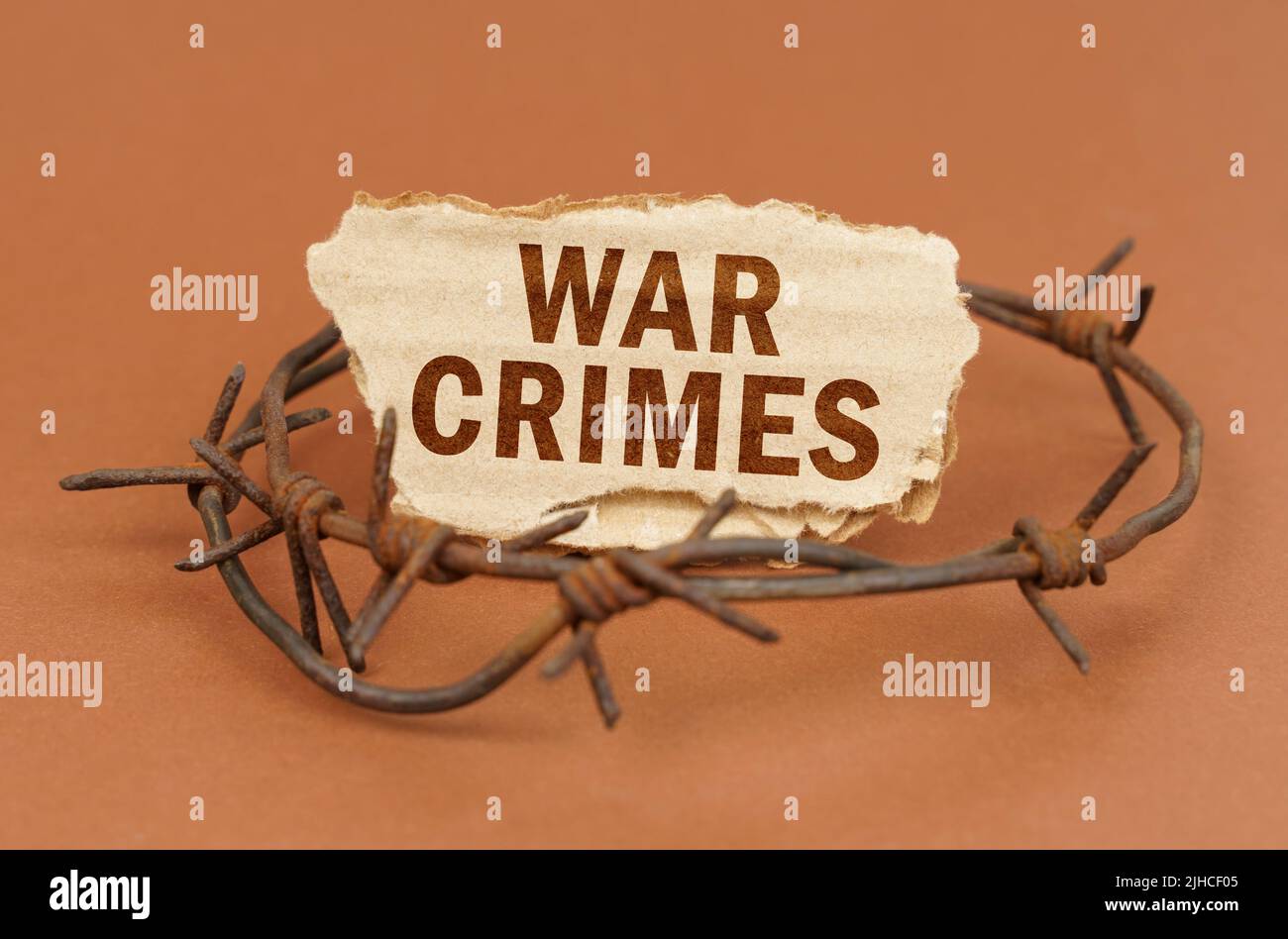 The Concept Of Law And Crime On A Brown Surface Barbed Wire And A The concept of law and crime on a brown surface barbed wire and a