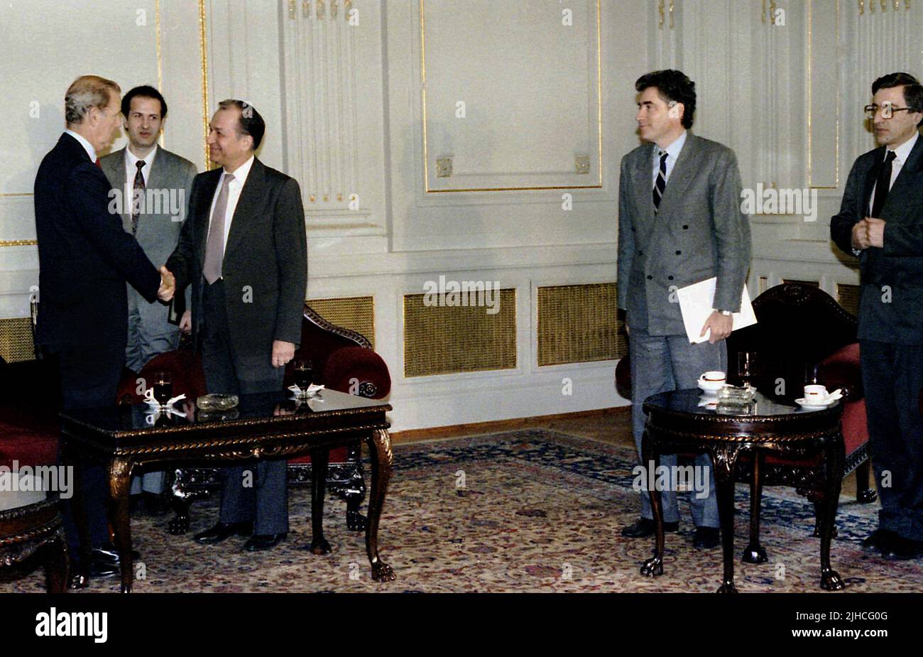 Bucharest, Romania, February 1990. U.S. Secretary of State under President George H. W. Bush, James Baker, visiting Romania, right after the Romanian Revolution of 1989. Meeting with the provisional FSN government, with Ion Iliescu (3rd from left) as president and Petre Roman (second from right) as Prime Minister. Stock Photo