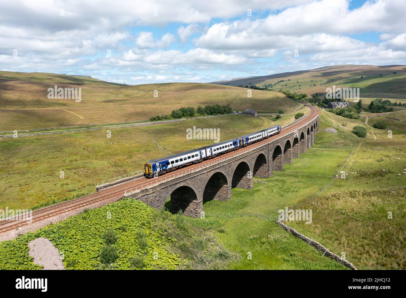 UK Railways. Northerns 158851 158901 head the 10:49 Leeds to Carlisle crossing Garsdale Viaduct on the Settle and Carlisle Railway. 13th July 2022 Stock Photo