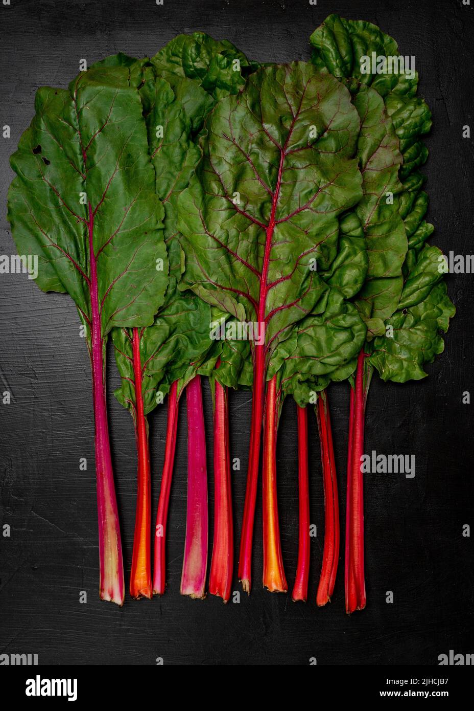 Swiss Chard on a dark surface Stock Photo
