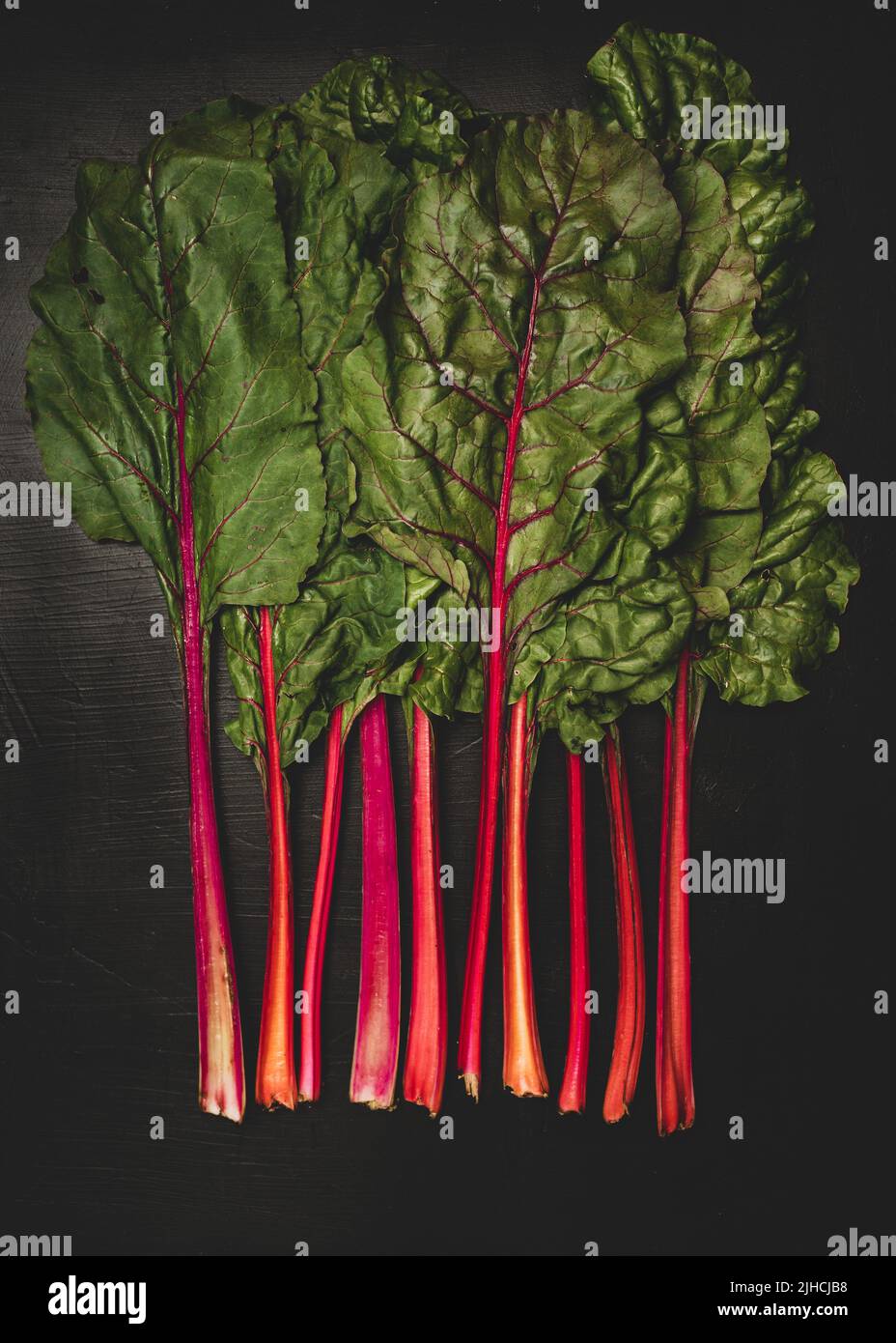 Swiss Chard on a dark surface Stock Photo