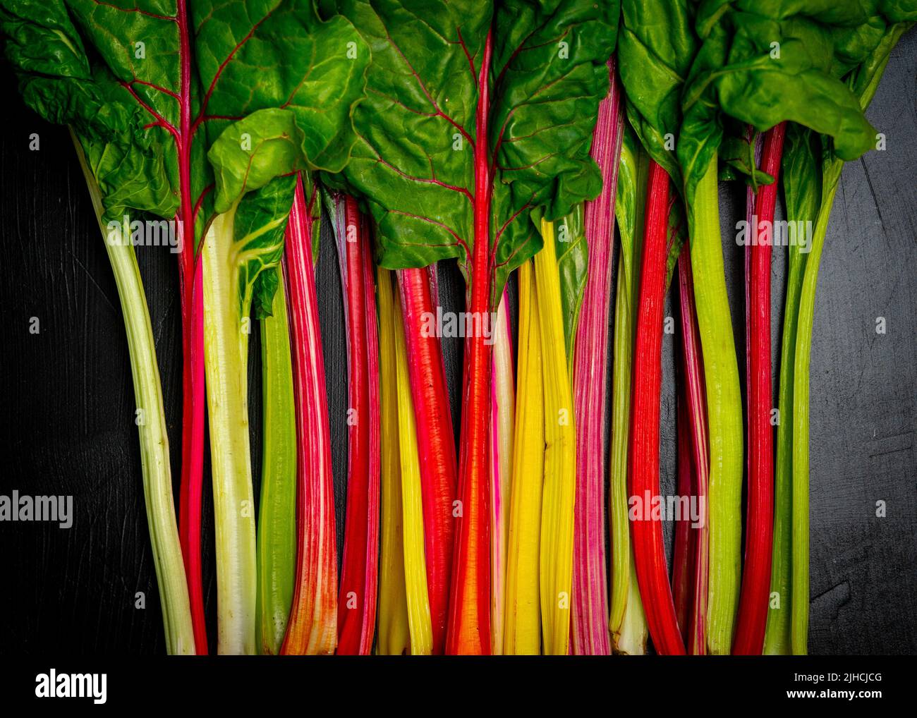 Swiss Chard on a dark surface Stock Photo