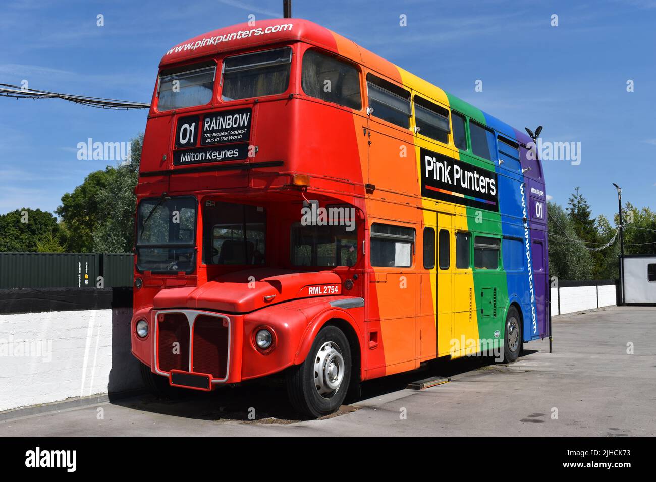 The Pink Punters rainbow-coloured double decker routemaster bus. Stock Photo