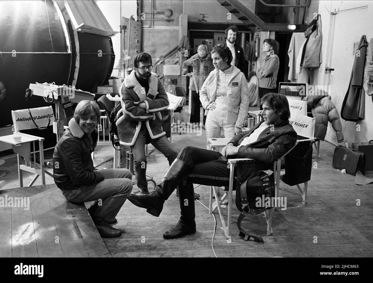 MARK HAMILL, GEORGE LUCAS, CARRIE FISHER, HARRISON FORD, STAR WARS: EPISODE V - THE EMPIRE STRIKES BACK, 1980 Stock Photo