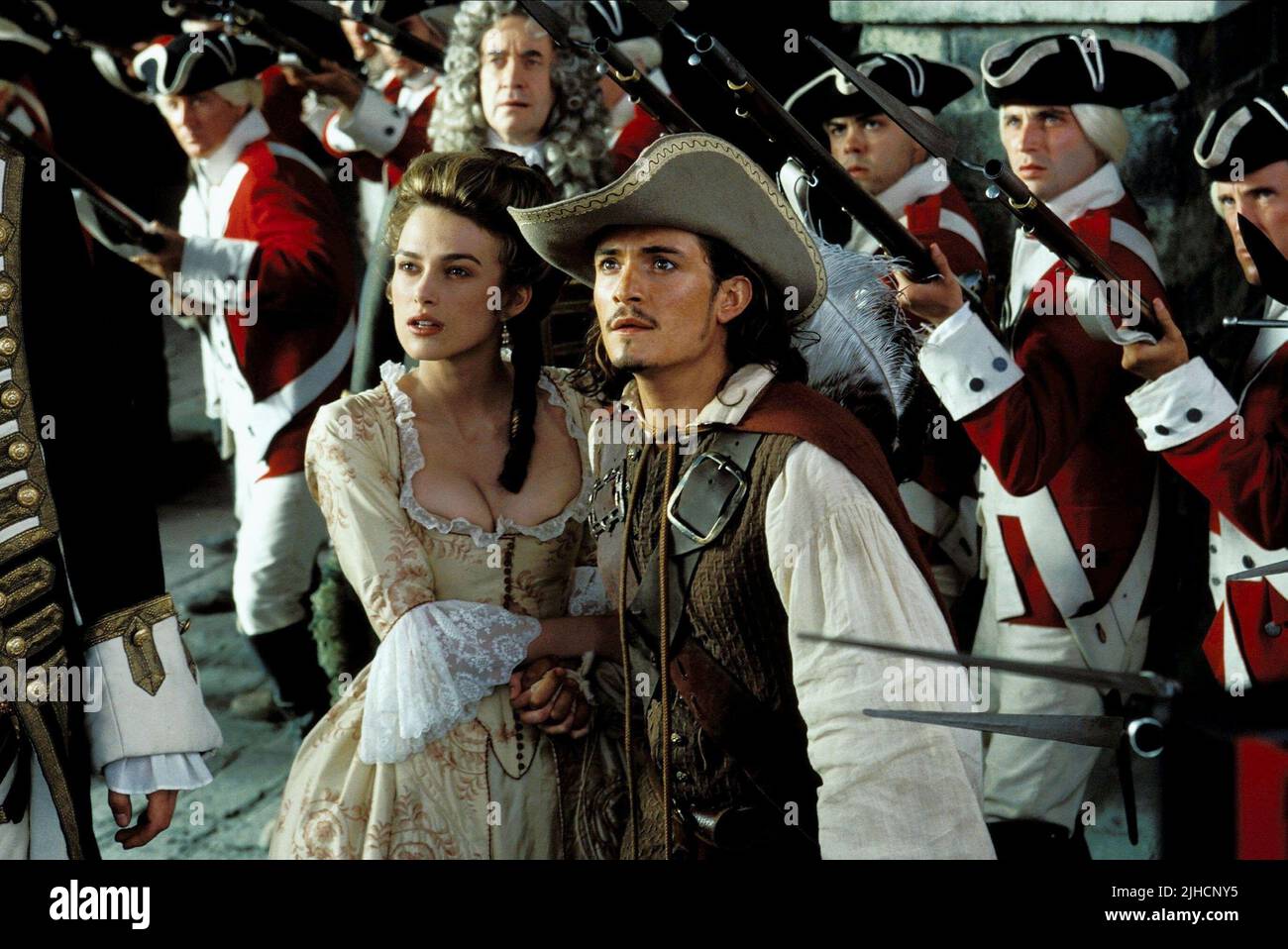 KEIRA KNIGHTLEY, ORLANDO BLOOM, PIRATES OF THE CARIBBEAN: THE CURSE OF THE BLACK PEARL, 2003 Stock Photo