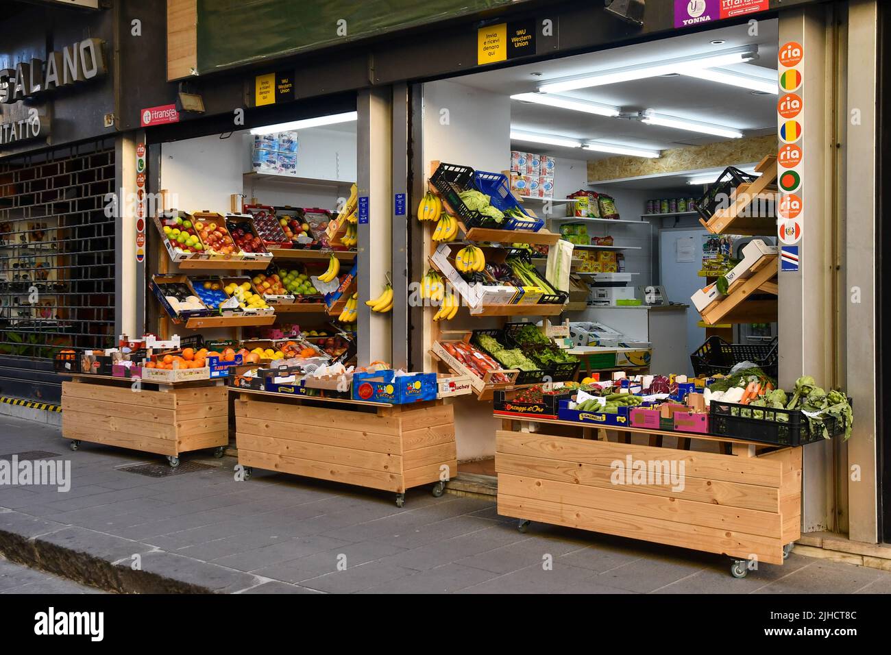 Exterior of a grocery store with fresh fruits and vegetables displayed on the sidewalk, Nervi, Genoa, Liguria, Italy Stock Photo