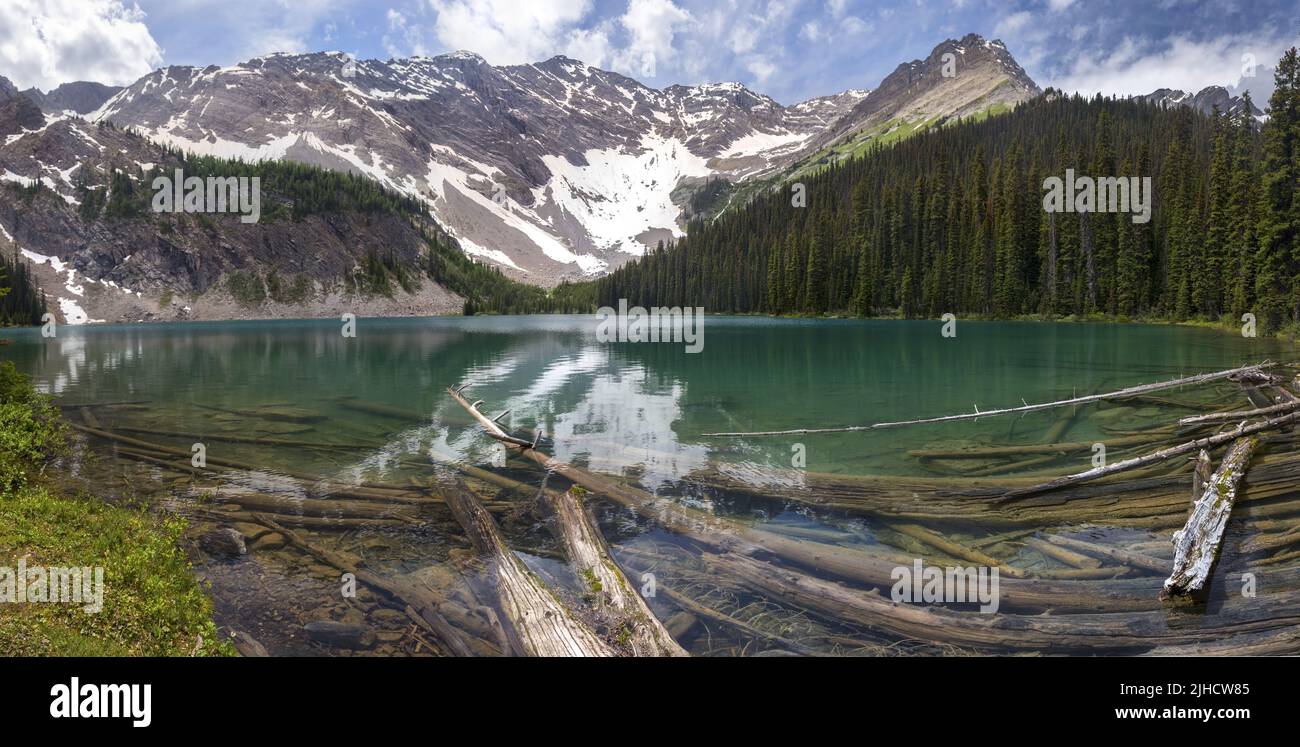 Scenic Panoramic Landscape View Emerald Green Mystic Lake East Ranges Banff National Park Canada.  Scenic Summertime Hiking Canadian Rocky Mountains Stock Photo