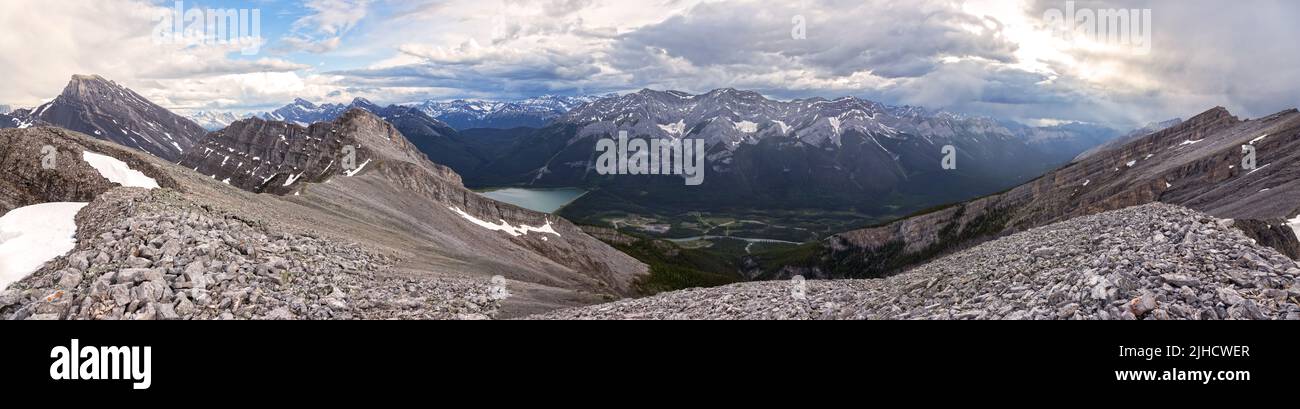 Canadian Rockies Panoramic Landscape, Alberta Kananaskis Country Scenic View from Above. Rugged Rocky Mountain Peaks and Stormy Sky on Horizon Stock Photo