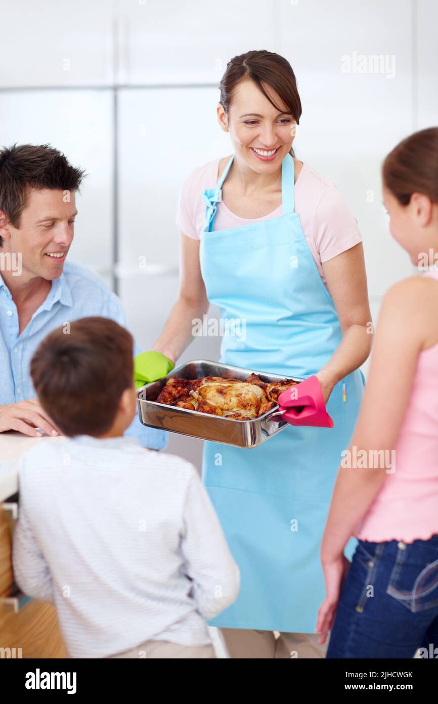 A Delicious Roast For My Lovely Family A Beautiful Mother Presenting A A Delicious Roast For My Lovely Family A Beautiful Mother Presenting A