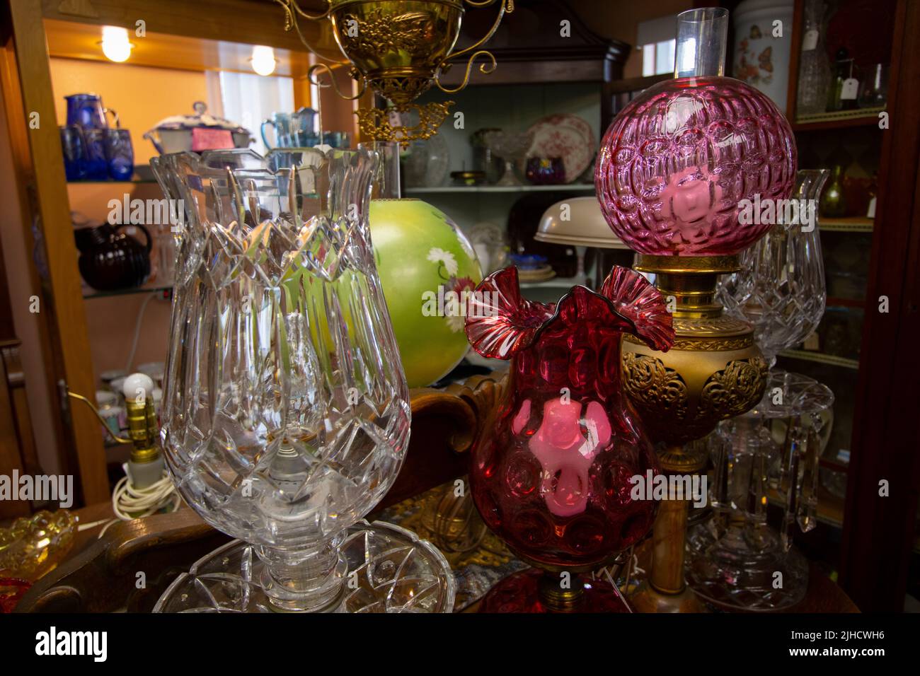 Vintage glassware in an antique store Stock Photo Alamy