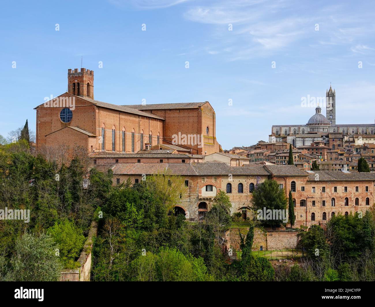 Brick buildings of Siena as seen from a distance, Tuscany, Italy. Stock Photo