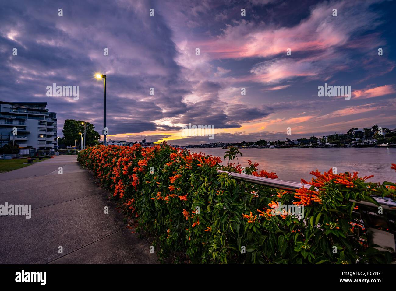Brisbane, Australia - River walk along the Brisbane river with beautiful sunset in the background Stock Photo