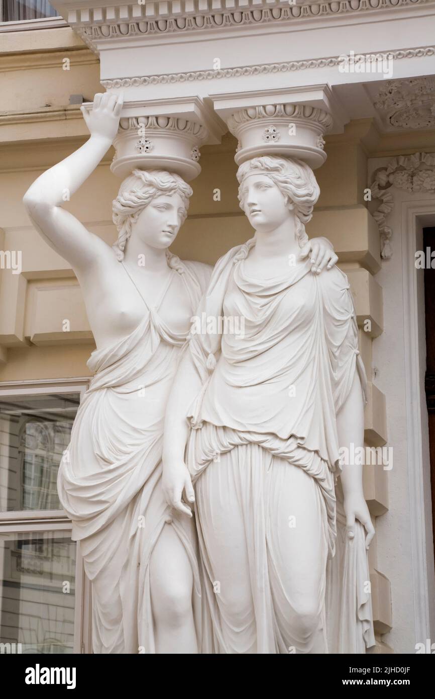 White caryatid statues at the Pallavicini Palace, Vienna, Austria. Stock Photo