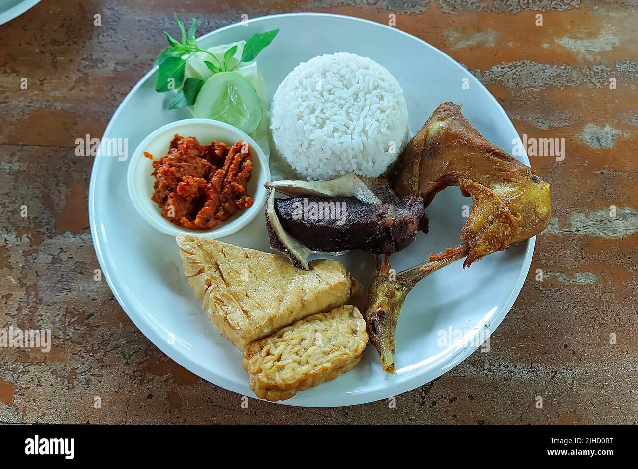 Fried Beef Ribs and Fried Chicken at Resto Jakarta, Indonesia Stock Photo