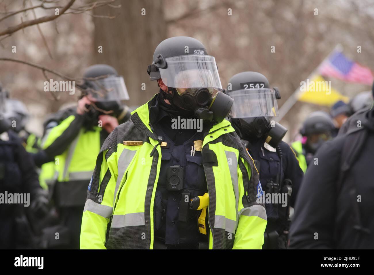 Police in riot gear gather outside the Capitol as it is being overrun by supporters of then-President Donald Trump on 6 Jan 2021. Stock Photo