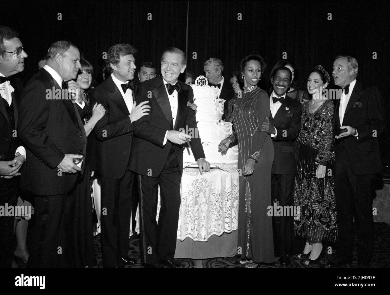 Milton Berle, Sammy Davis Jr., James Stewart, Angie Dickinson and Jack Lemmon pictured with Don Rickles, Steve Lawrence, Tom Bosley,,Altovise Davis and Suzanne Pleshette as the Friars Club of Beverly Hills Honor Sammy Davis Jr. with Lifetime Achievement Award at The Beverly Hilton Hotel on November 25, 1980. Credit: Ralph Dominguez/MediaPunch Stock Photo