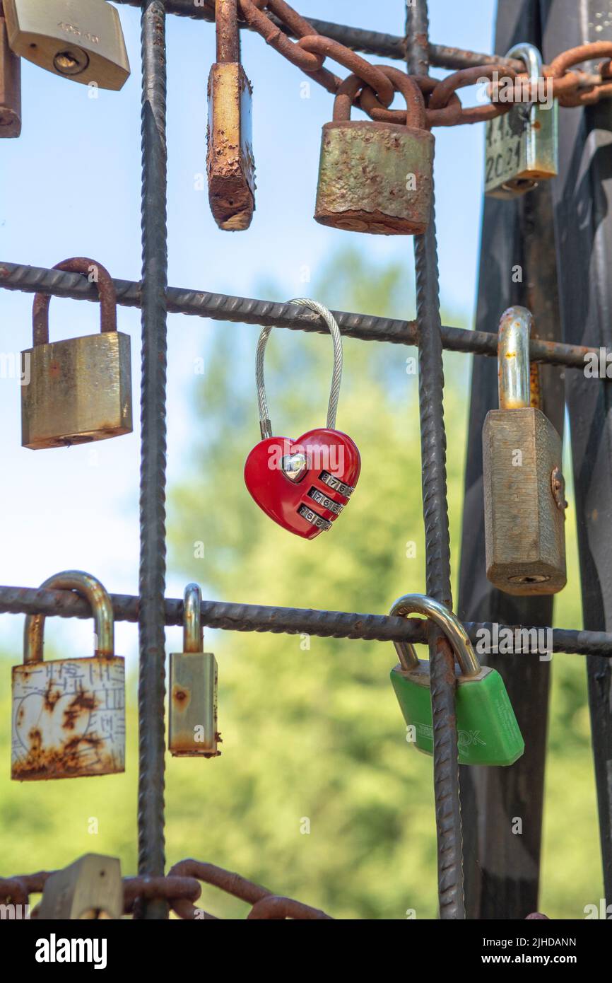 Love padlocks representing ever lasting love. Red heart love lock Stock