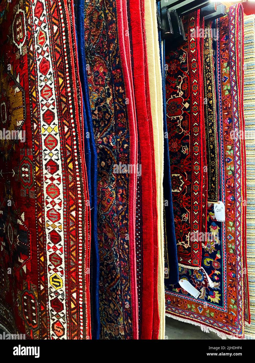 Persian rugs in a shop Stock Photo Alamy