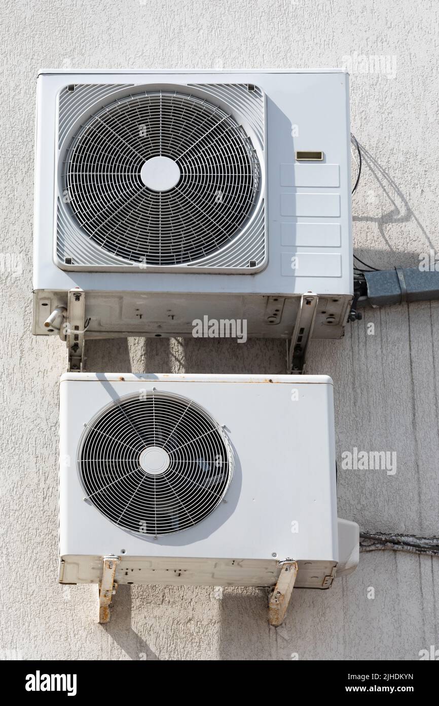 cooling unit for duct air conditioner hanging on the wall of the