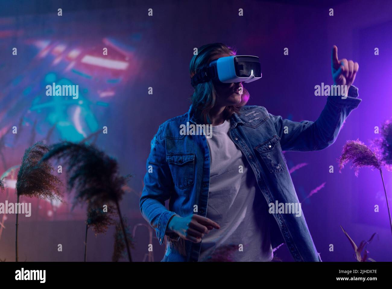 Jhdx Metaverse digital cyber world technology, a man with virtual reality VR ...