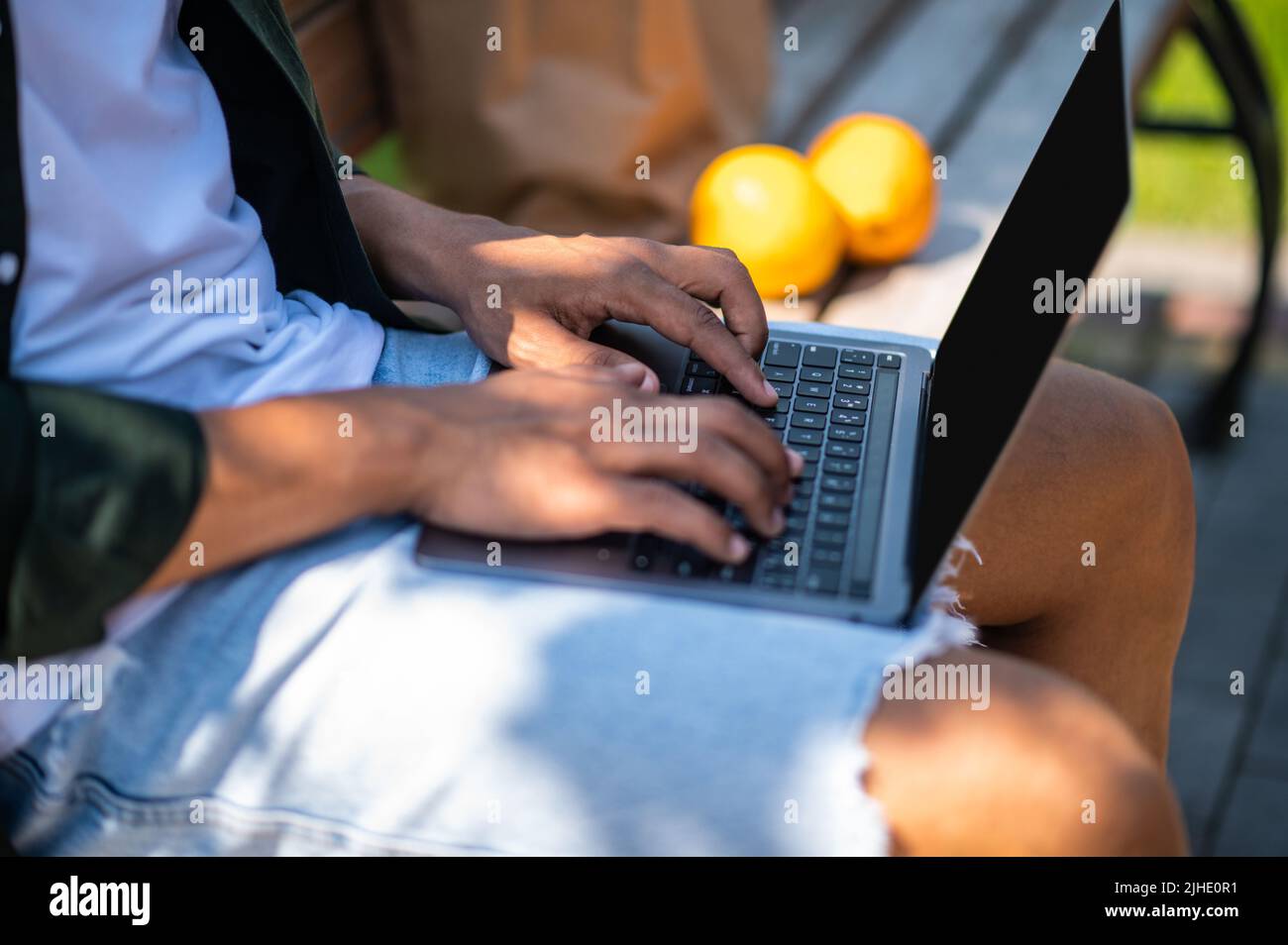 Dark skinned hands typing hi-res stock photography and images - Alamy