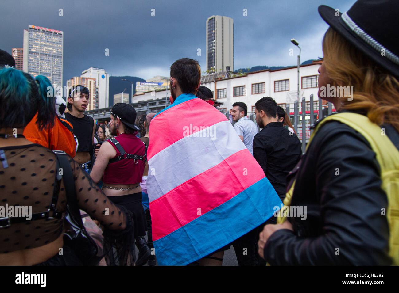 A demonstrator uses a trans community flag during the 2022 'Yo Marcho Trans' transgender community pride parade in Bogota, Colombia on July 15, 2022. Stock Photo