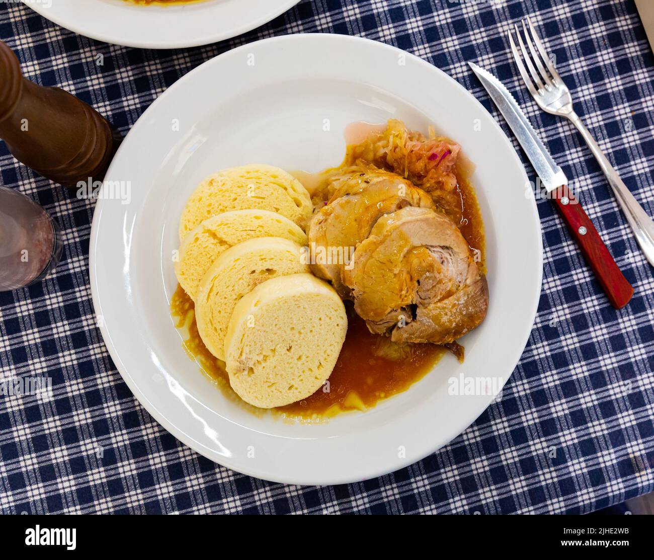 Top view of Czech dumplings with sauerkraut and pork Stock Photo Alamy