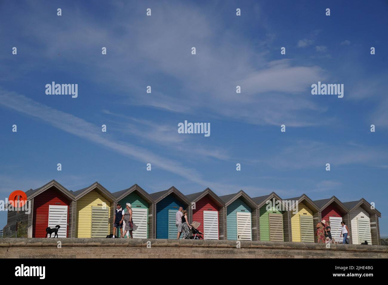 Colourful beach huts in Blyth, Northumberland, on the north east coast, as the heatwave sweeps across England. Picture date: Monday July 18, 2022. Stock Photo