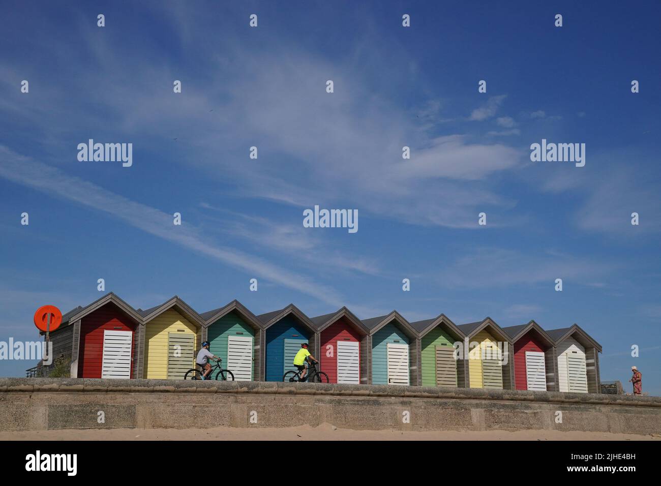 Colourful beach huts in Blyth, Northumberland, on the north east coast, as the heatwave sweeps across England. Picture date: Monday July 18, 2022. Stock Photo