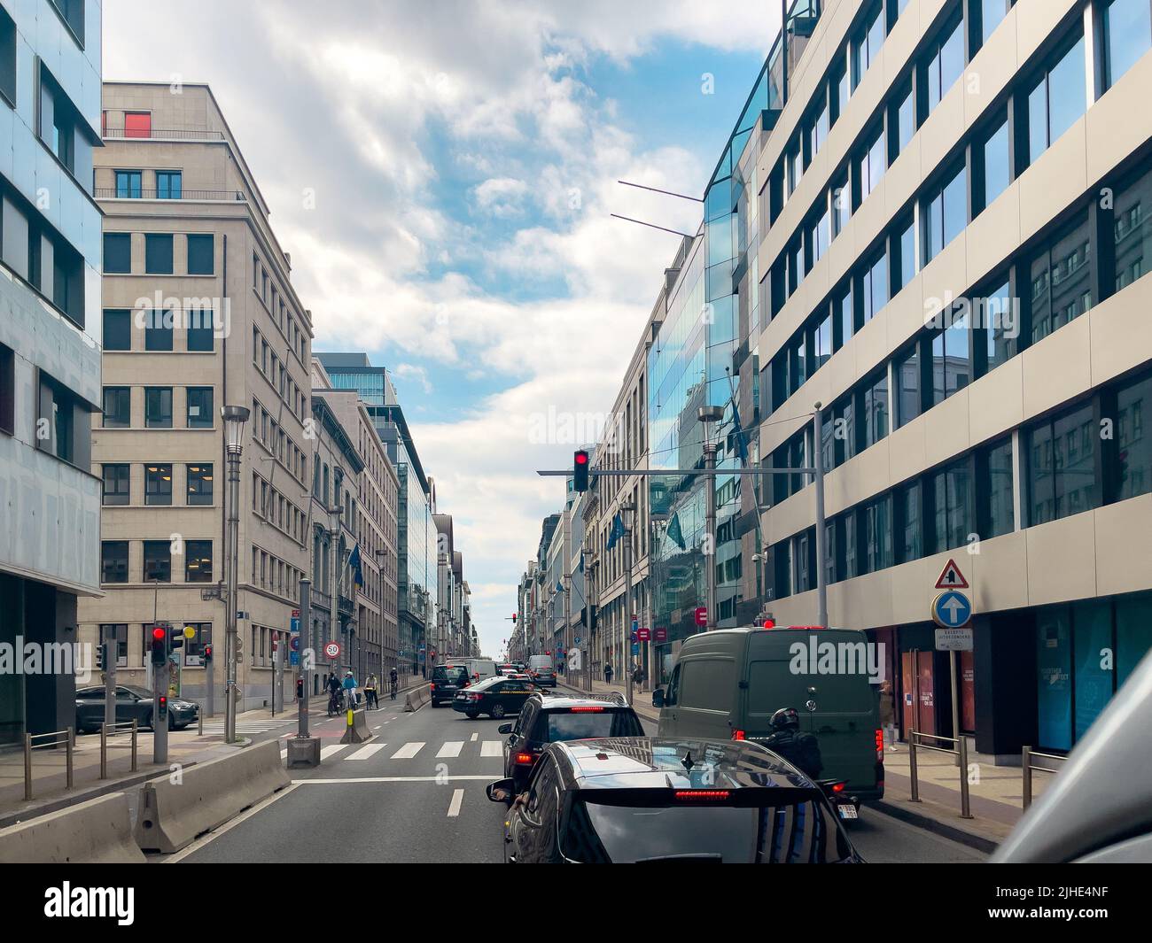 Few cars stopped at the Red traffic light in Brussels Stock Photo - Alamy
